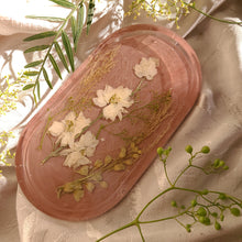 Load image into Gallery viewer, White Larkspur vanity tray, 7 inches x 3.75 inches, Dusty blush taupe & soft lace background, real pressed flower in resin, FDA food safe resin