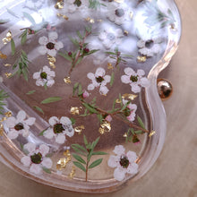 Load image into Gallery viewer, Heart-Shaped Floral clutch, white tea tree blossom, resin clutch, removable golden crossbody chain, 6.25 inches x 5.5 inches, white frosty sides