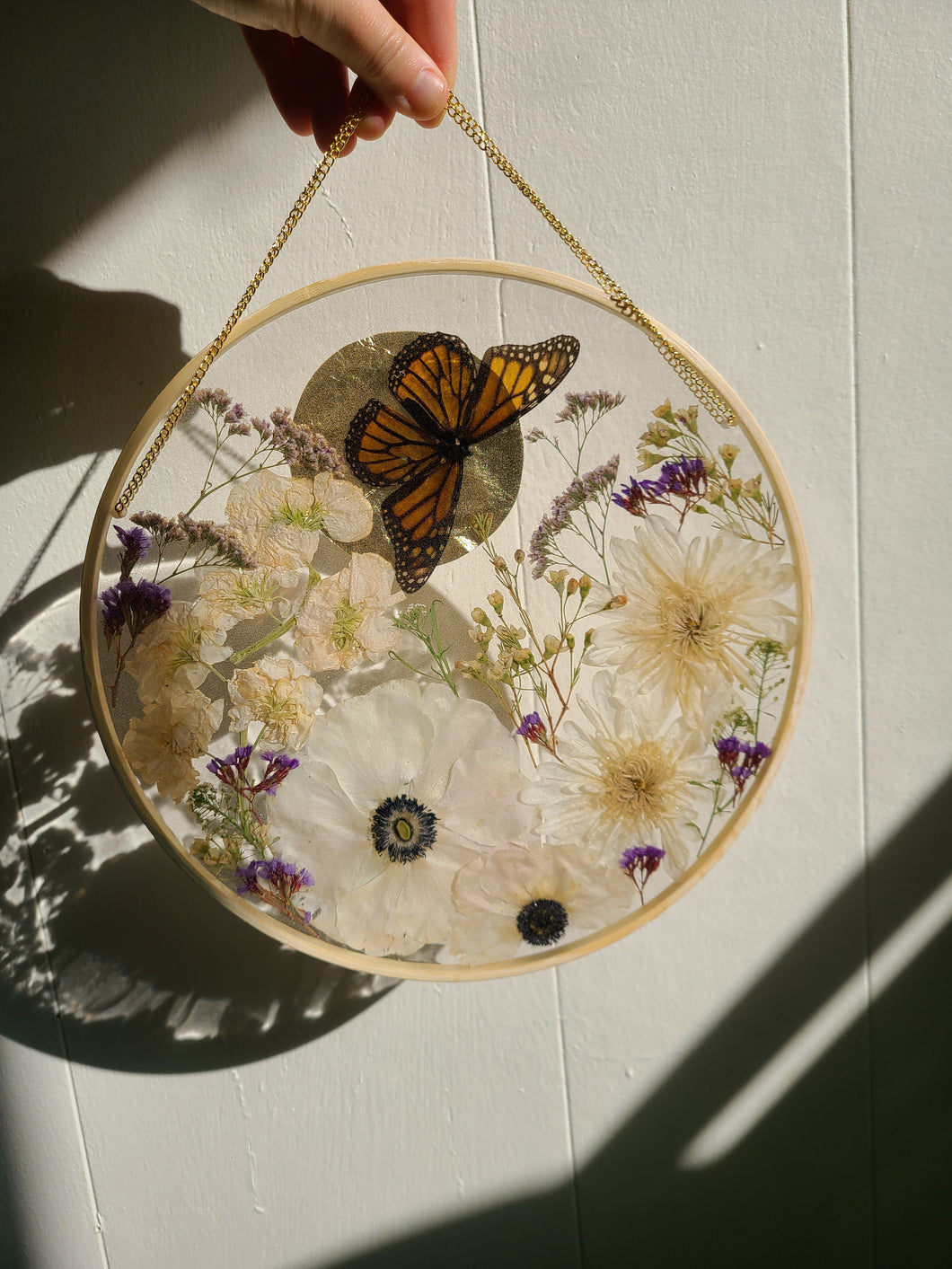 Large Monarch Butterfly Garden wall hanging, 10 inches in diameter, clear background, golden sun