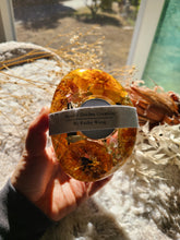 Load image into Gallery viewer, Tea ligh candle holder, orange slices, real dried flower in resin, organic pebbled shape
