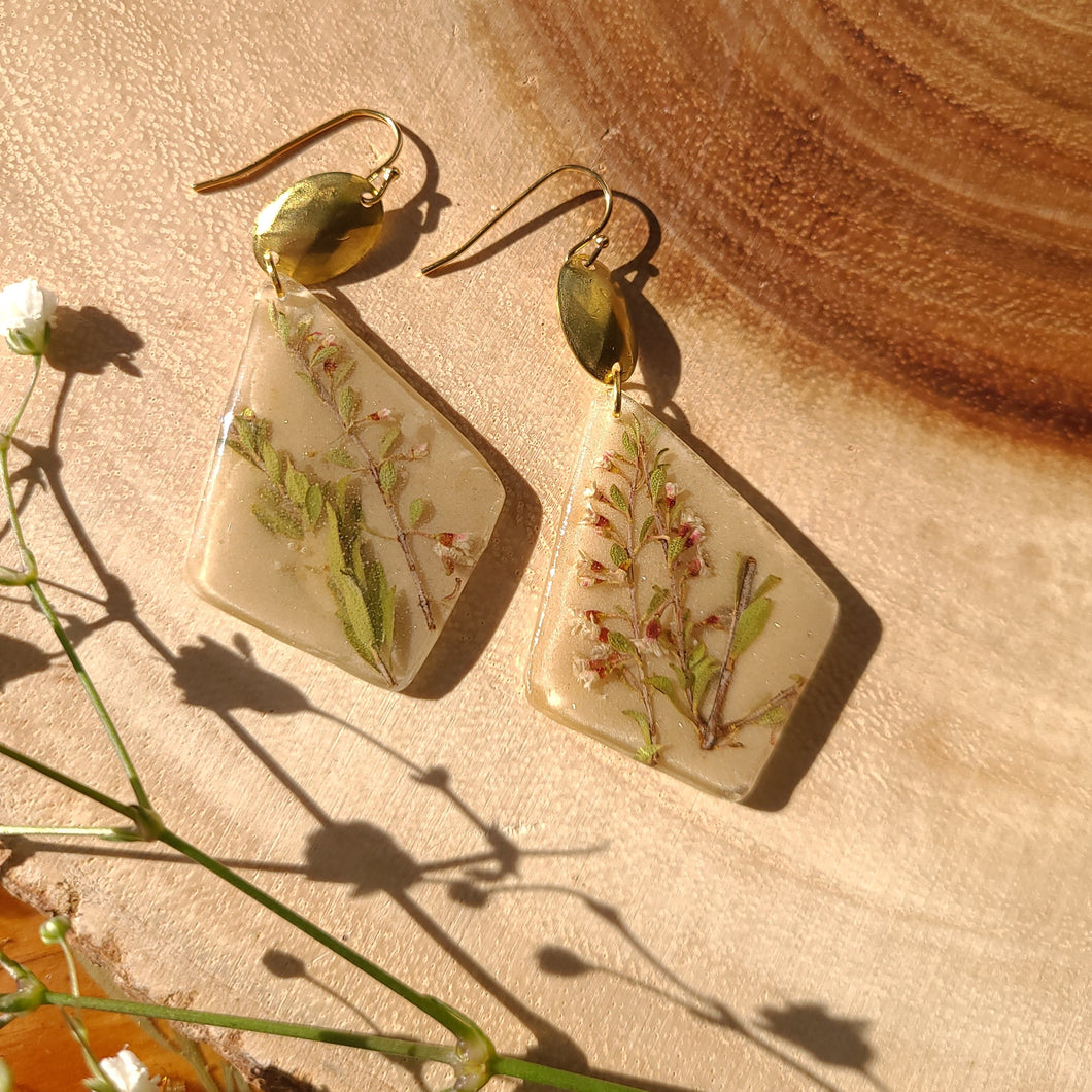 Tea tree earrings, real pressed flower in resin, taupe background