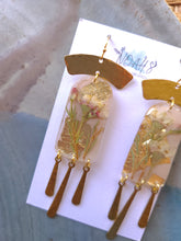 Load image into Gallery viewer, Spring collection-dusty pink blossom, real pressed flower in resin, hammered brass tassels

