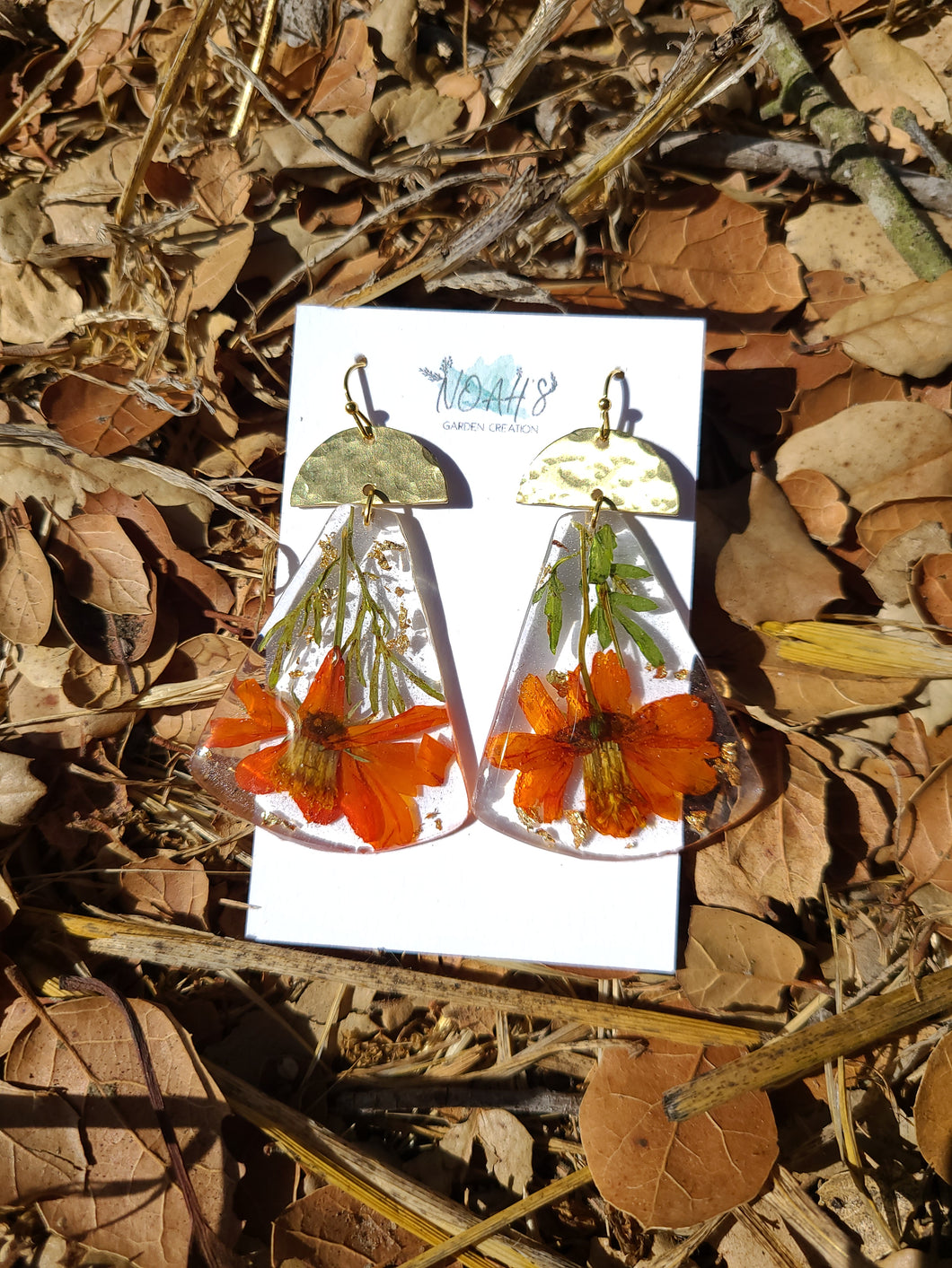 Fall orange calendula, lucite earring, hammered brass